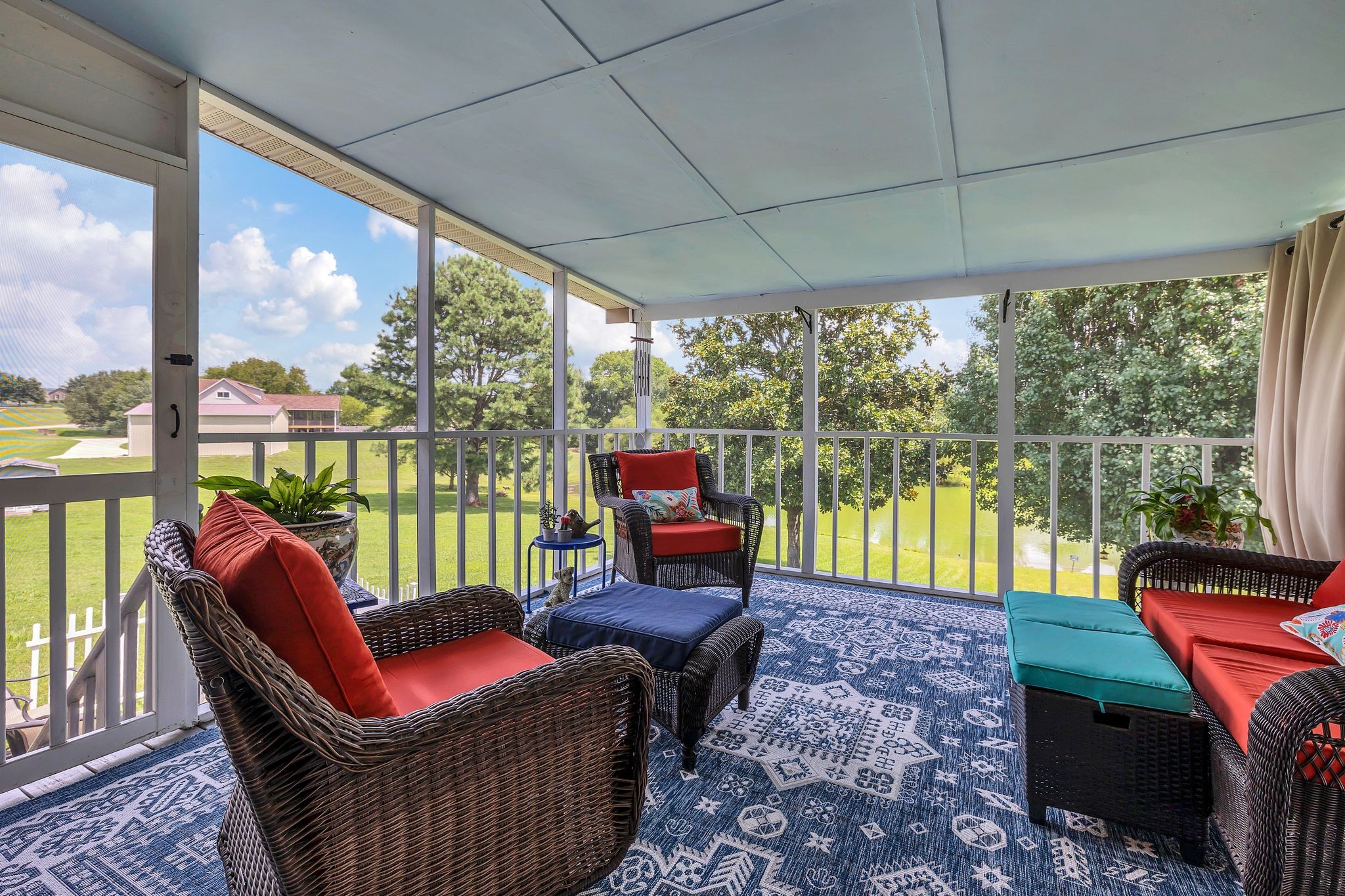 2113 Spring Lake Drive Spring Hill, TN 37174 - Photo 2 of 27 a living room with patio furniture and a floor to ceiling window