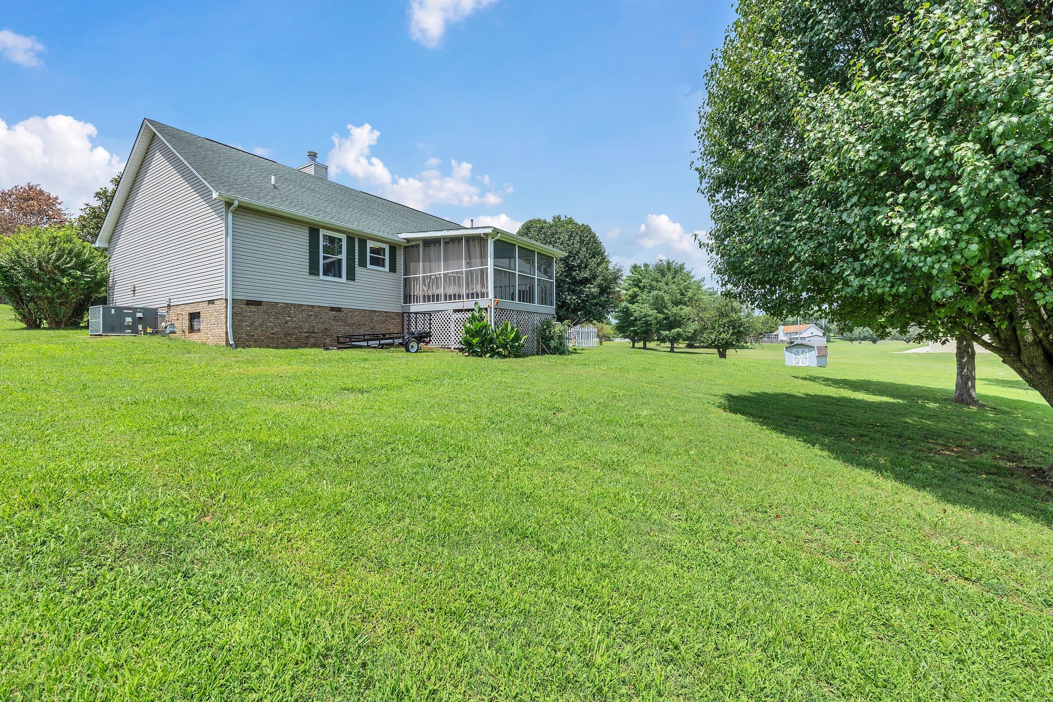 2113 Spring Lake Drive Spring Hill, TN 37174 - Photo 24 of 27 a view of a house with a big yard