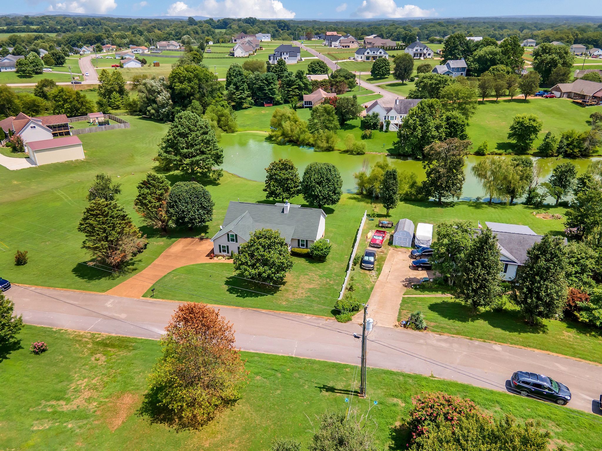 2113 Spring Lake Drive Spring Hill, TN 37174 - Photo 25 of 27 a view of a garden with a lake view