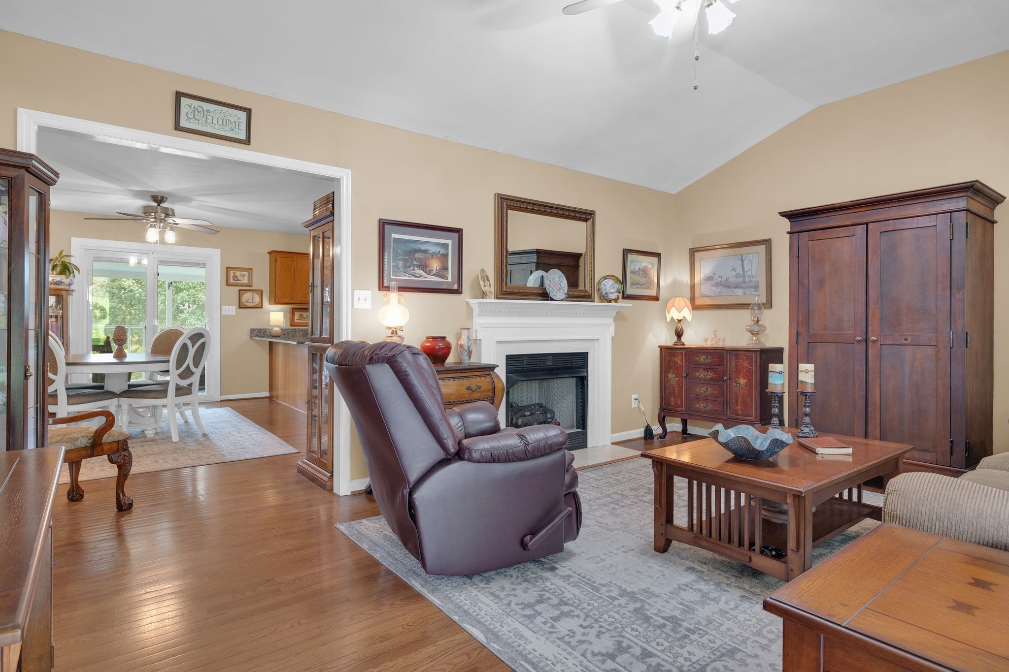2113 Spring Lake Drive Spring Hill, TN 37174 - Photo 7 of 27 a living room with furniture and a fireplace