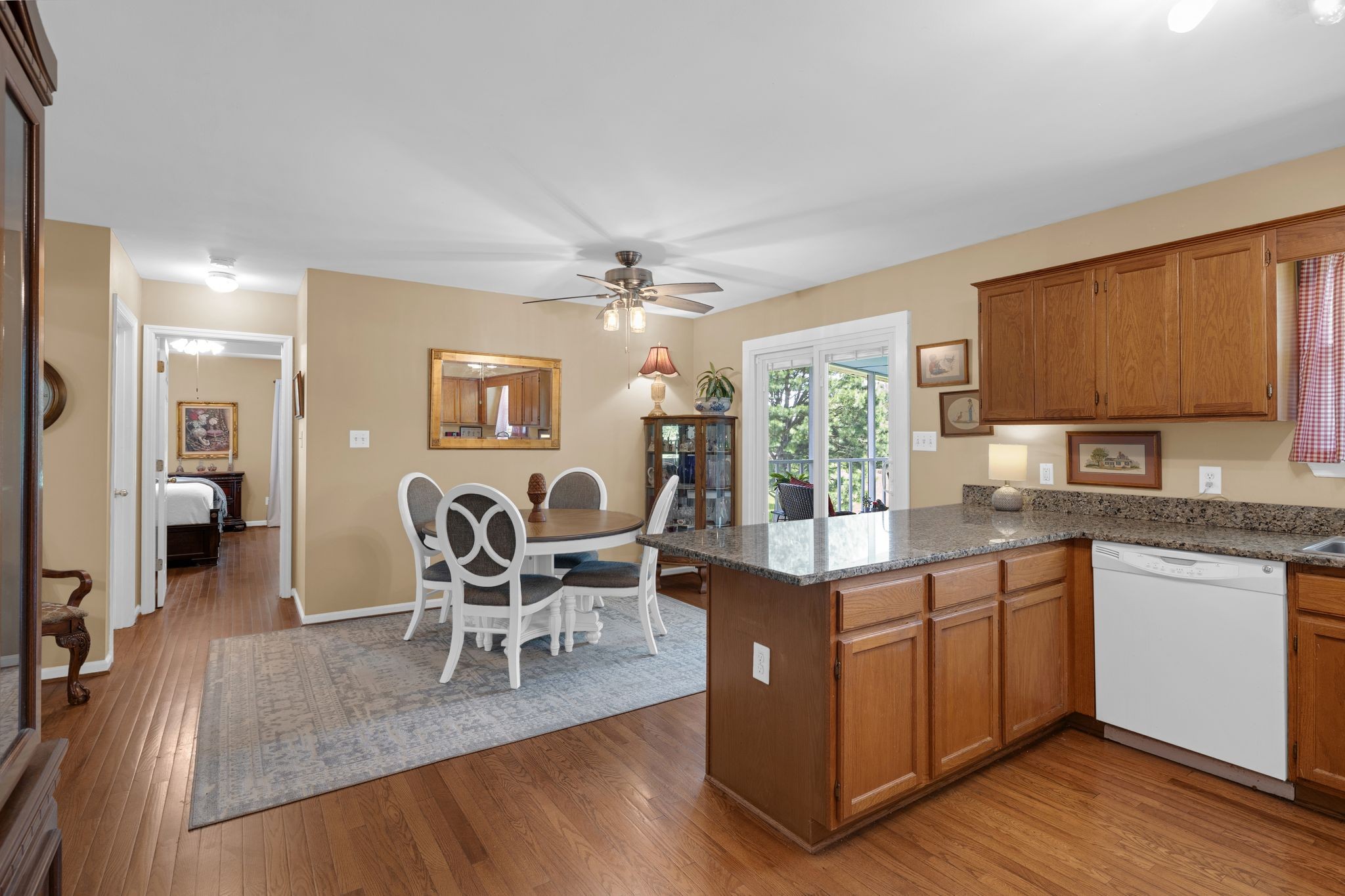 2113 Spring Lake Drive Spring Hill, TN 37174 - Photo 10 of 27 a view of a dining room with furniture and wooden floor