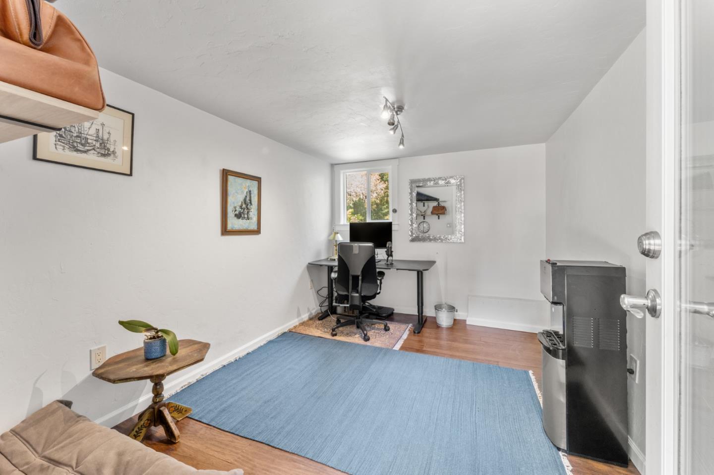 140 Baker Road Aptos, CA 95003 - Photo 42 of 62 a view of a workspace with furniture and gym equipment