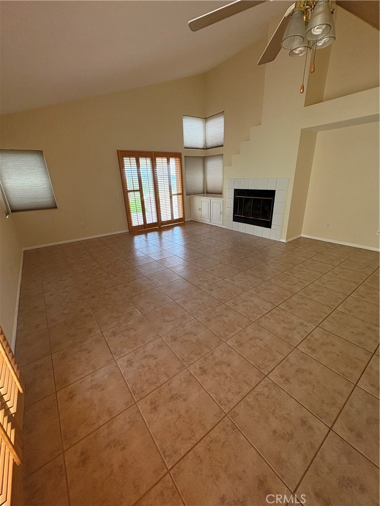 7149 Rockspring Lane Highland, CA 92346 - Photo 9 of 29 View of living room with fireplace