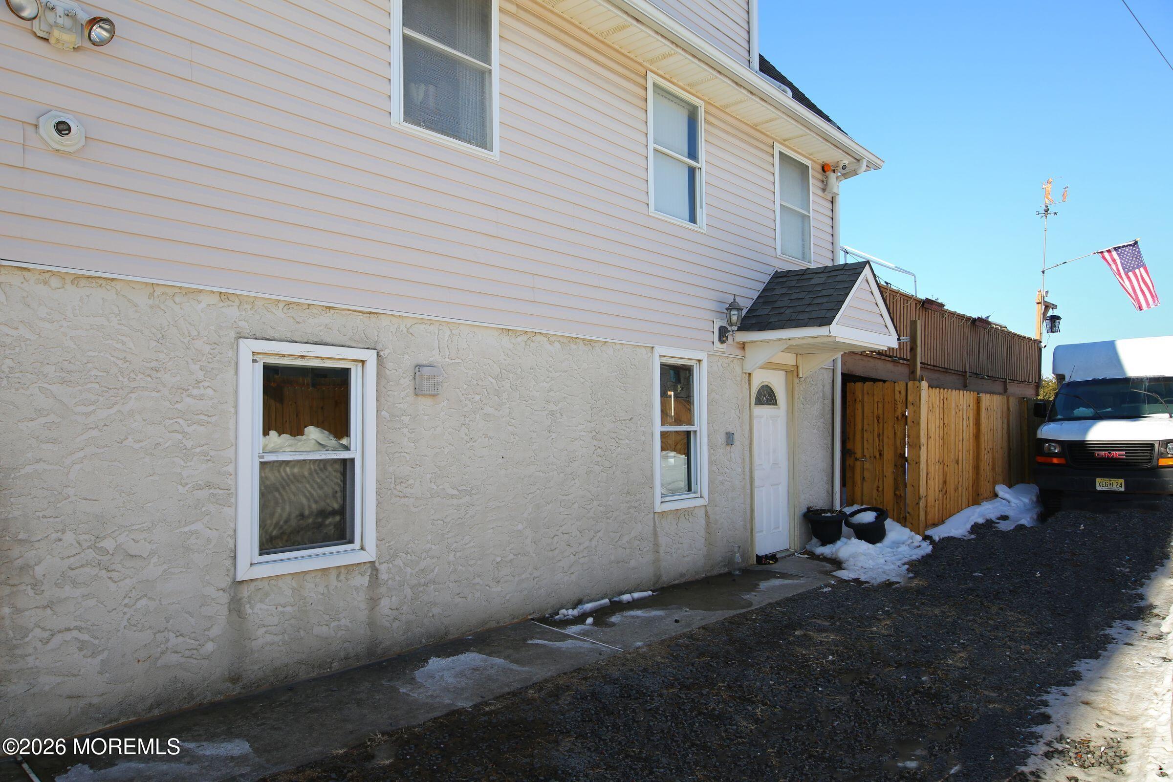 60 Matthew Street, Unit 1 Highlands, NJ 07732 - Photo 1 of 33 a view of a house with a yard