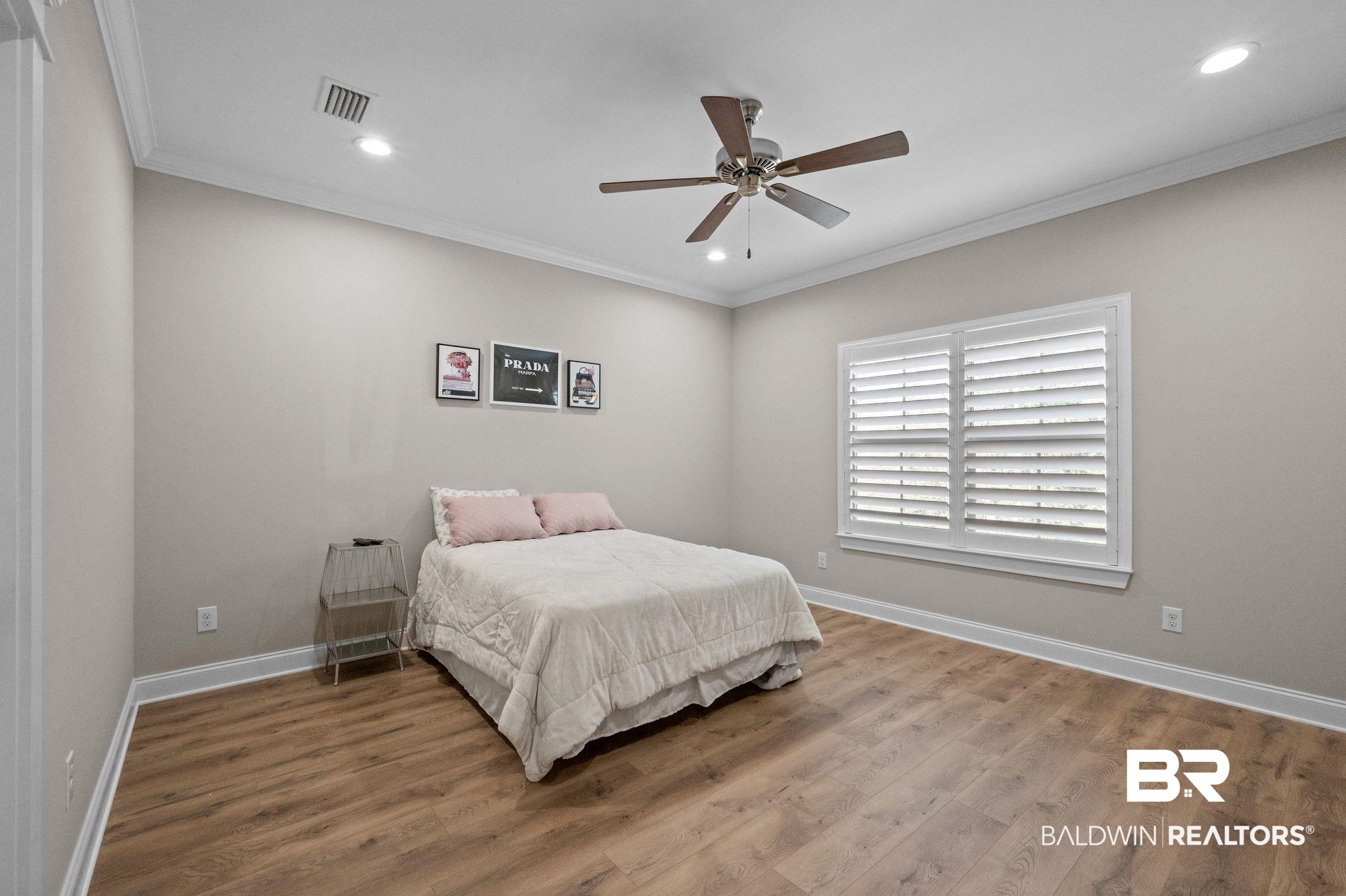 32194 Badger Court Daphne, AL 36527 - Photo 23 of 49 Bedroom with recessed lighting, crown molding, wood finished floors, and a ceiling fan