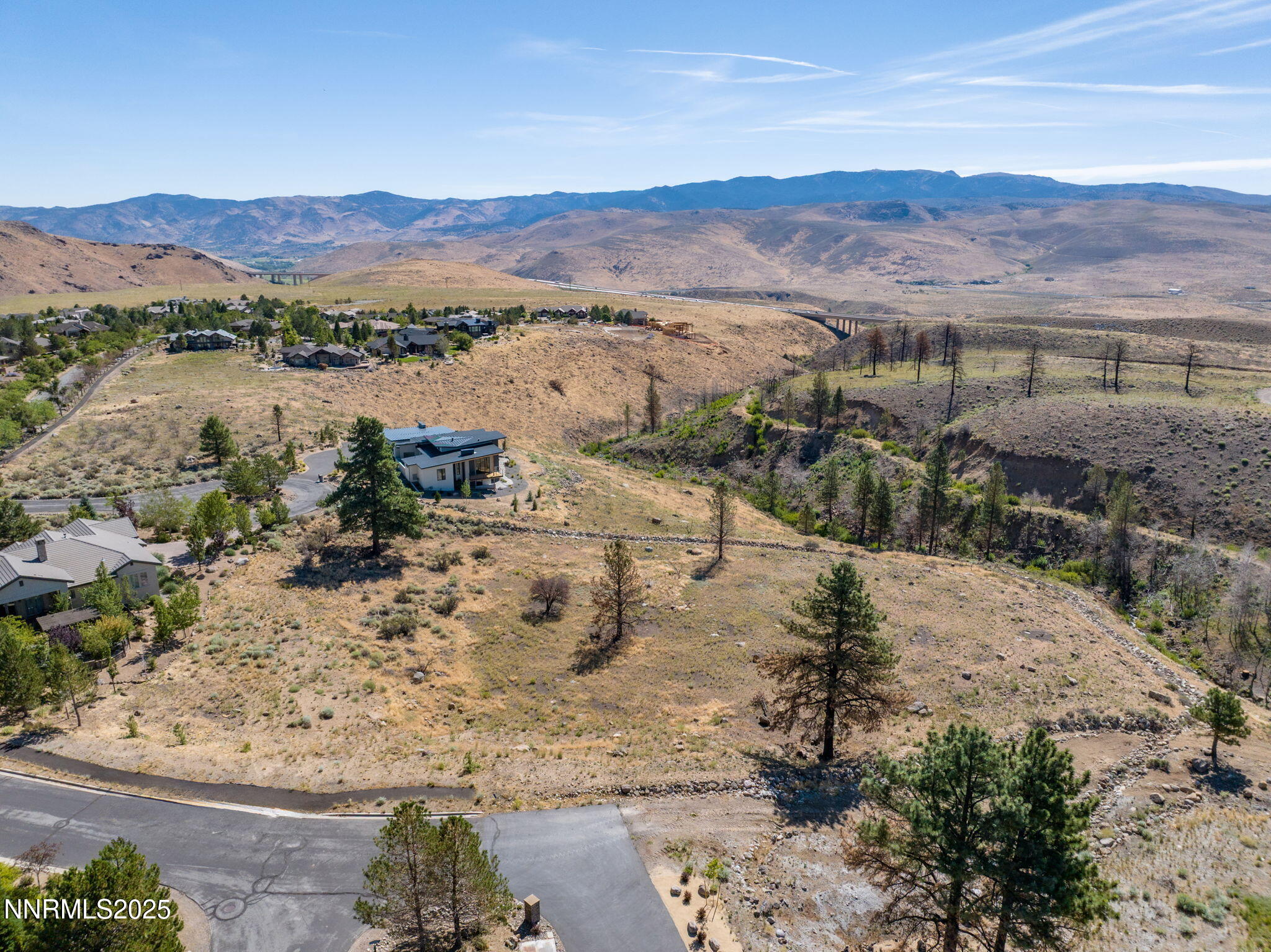 203 South Argyle Court Reno, NV 89511 - Photo 15 of 30 a view of a lake with mountains and a mountain view