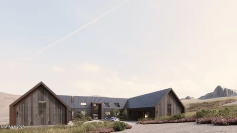 a front view of a house with a big yard