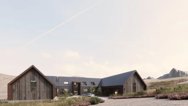 a front view of a house with a big yard