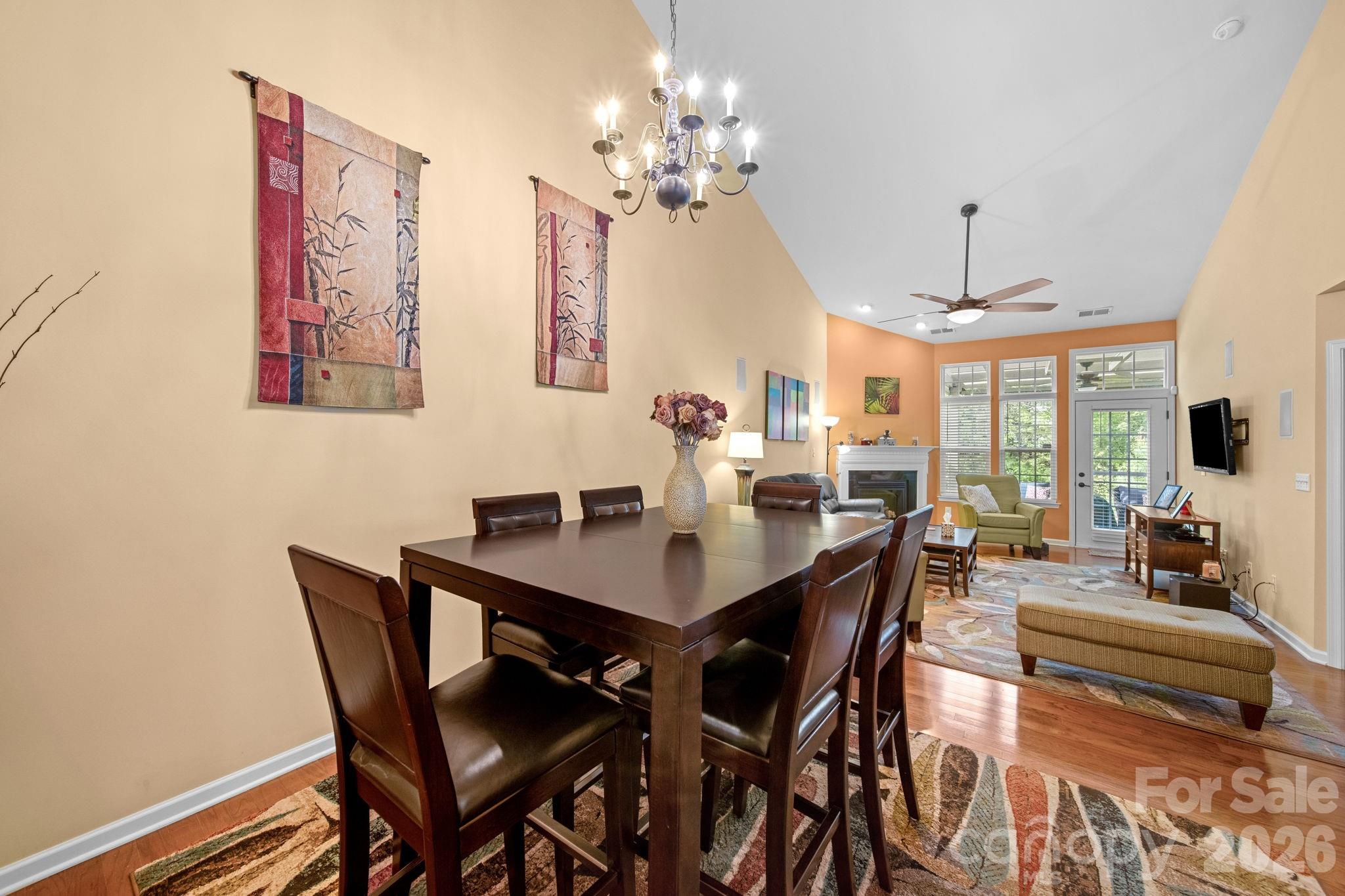 115 Inlet Point Drive Fort Mill, SC 29708 - Photo 17 of 48 a view of a dining room with furniture window and wooden floor