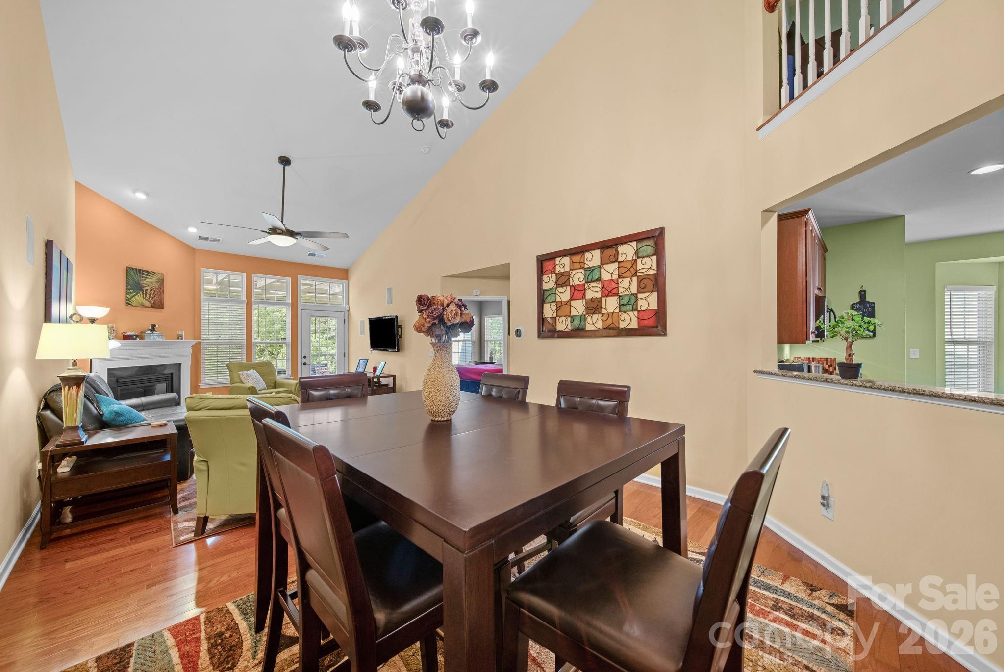 115 Inlet Point Drive Fort Mill, SC 29708 - Photo 18 of 48 a view of a dining room with furniture window and wooden floor