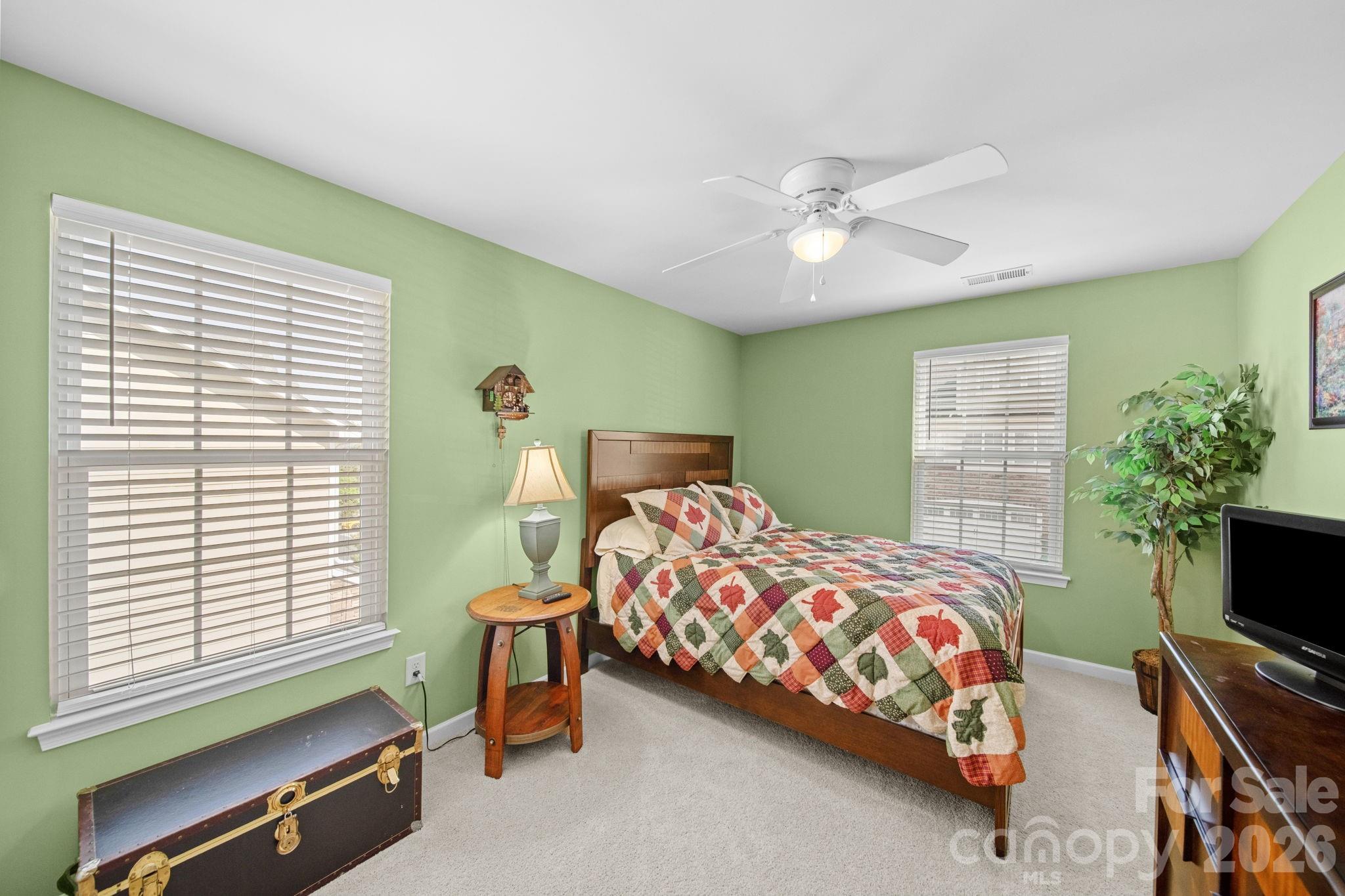 115 Inlet Point Drive Fort Mill, SC 29708 - Photo 24 of 48 a bedroom with a bed and a window