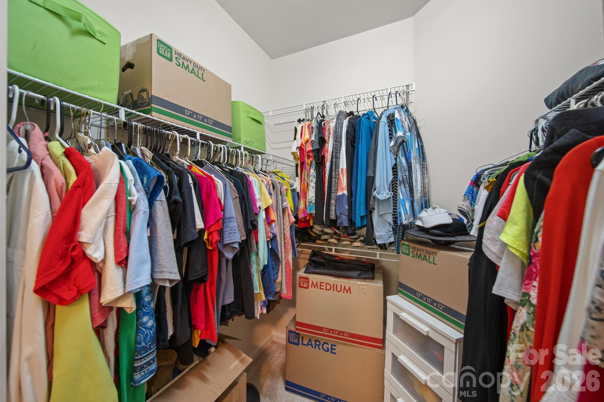 115 Inlet Point Drive Fort Mill, SC 29708 - Photo 34 of 48 a view of walk in closet with clothes