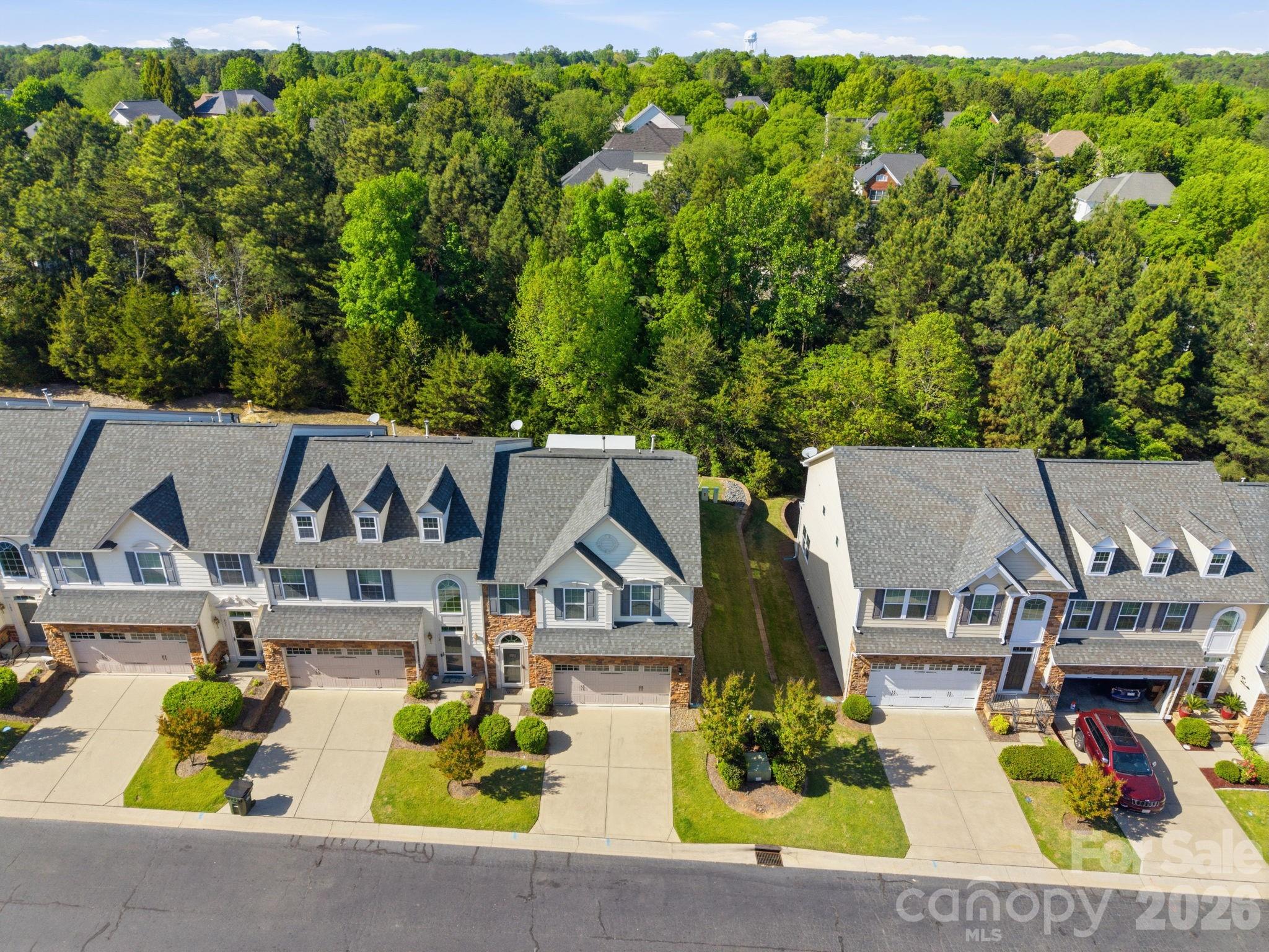 115 Inlet Point Drive Fort Mill, SC 29708 - Photo 40 of 48 an aerial view of a house with swimming pool and big yard