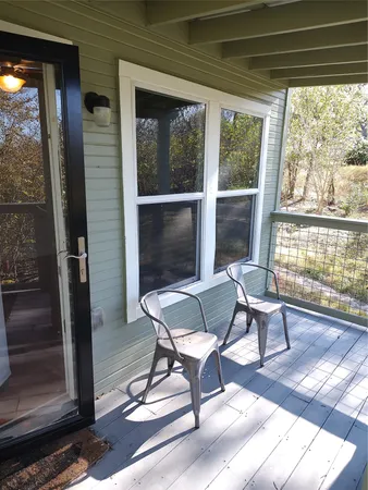 a work room with furniture and windows
