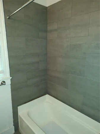 a bathroom with a bathtub