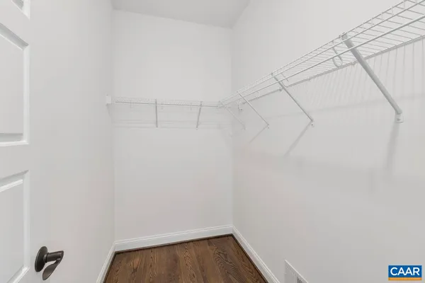 a view of a room with racks on the wall