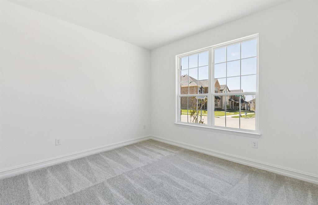 4901 Ripley Avenue Celina, TX 75009 - Photo 15 of 21 Spacious secondary bedroom with large windows