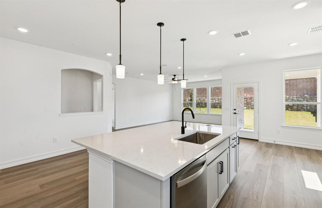 4901 Ripley Avenue Celina, TX 75009 - Photo 6 of 21 Large island overlooking gathering room and dining areas