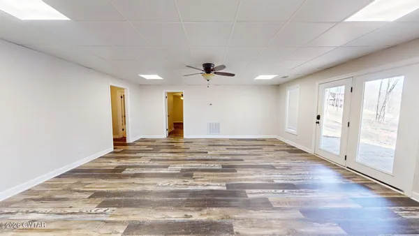 a view of an empty room and window