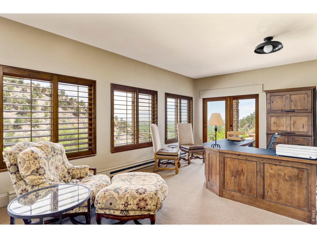 86 South Cedar Brook Road Boulder, CO 80304 - Photo 25 of 40 a living room with furniture and large windows