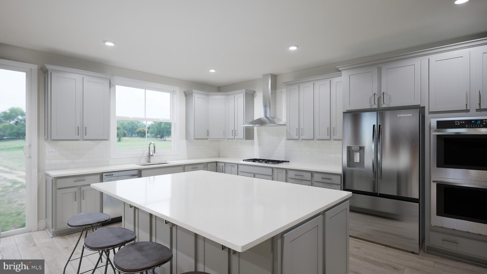 Snowden Bridge Boulevard Stephenson, VA 22656 - Photo 17 of 53 a kitchen with stainless steel appliances granite countertop a sink a stove a refrigerator and island