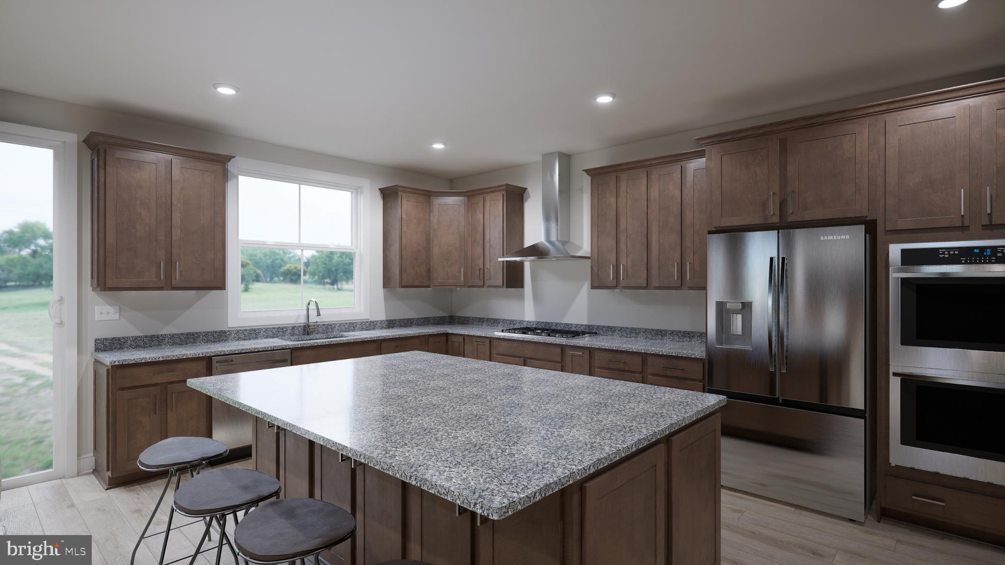 Snowden Bridge Boulevard Stephenson, VA 22656 - Photo 29 of 53 a kitchen with a table chairs refrigerator and microwave