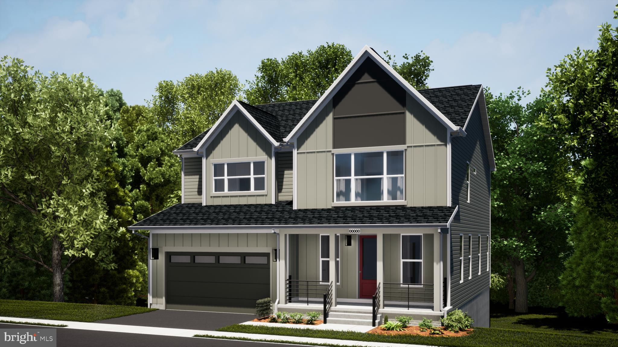 Snowden Bridge Boulevard Stephenson, VA 22656 - Photo 3 of 53 a front view of a house with a garden