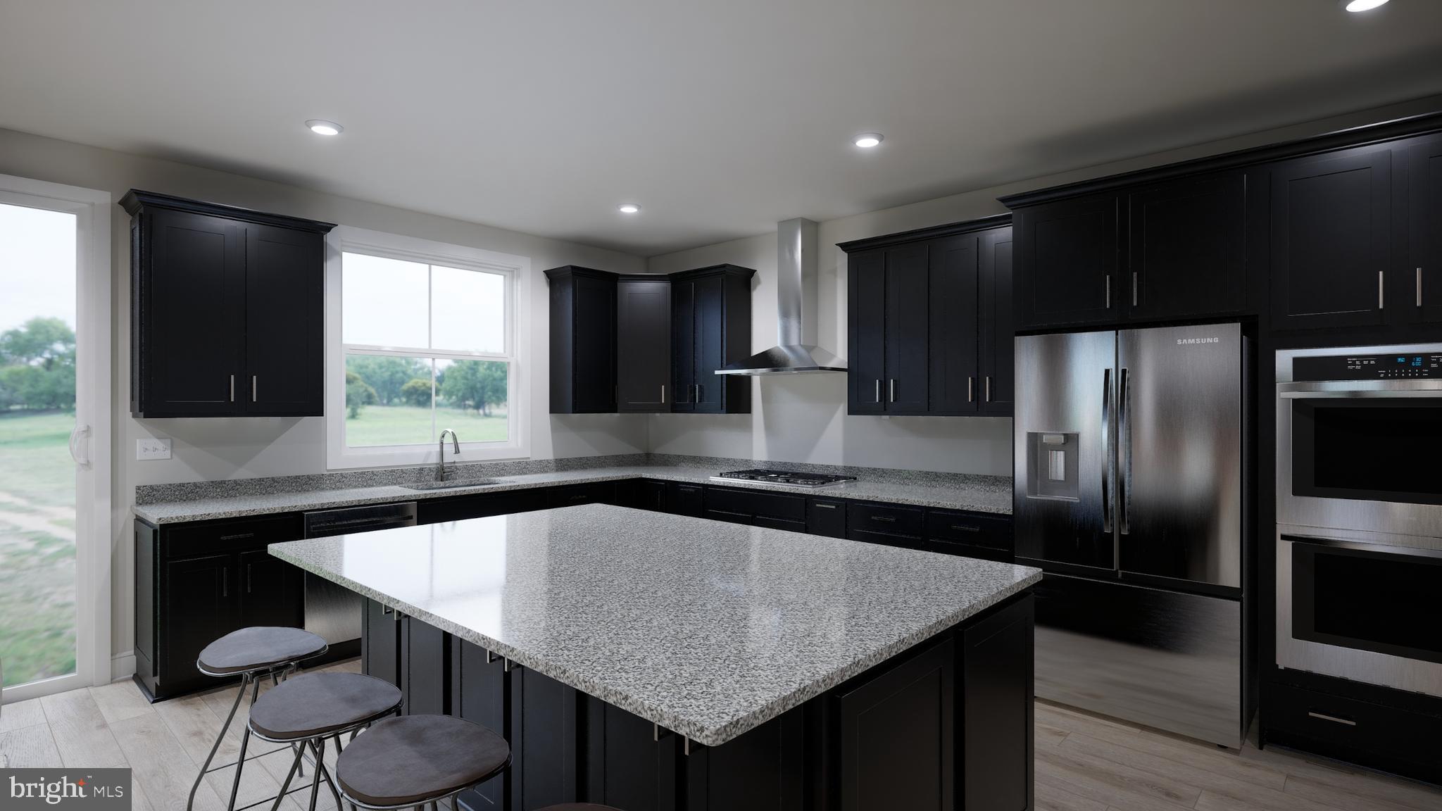 Snowden Bridge Boulevard Stephenson, VA 22656 - Photo 37 of 53 a kitchen with granite countertop kitchen island a counter space and stainless steel appliances