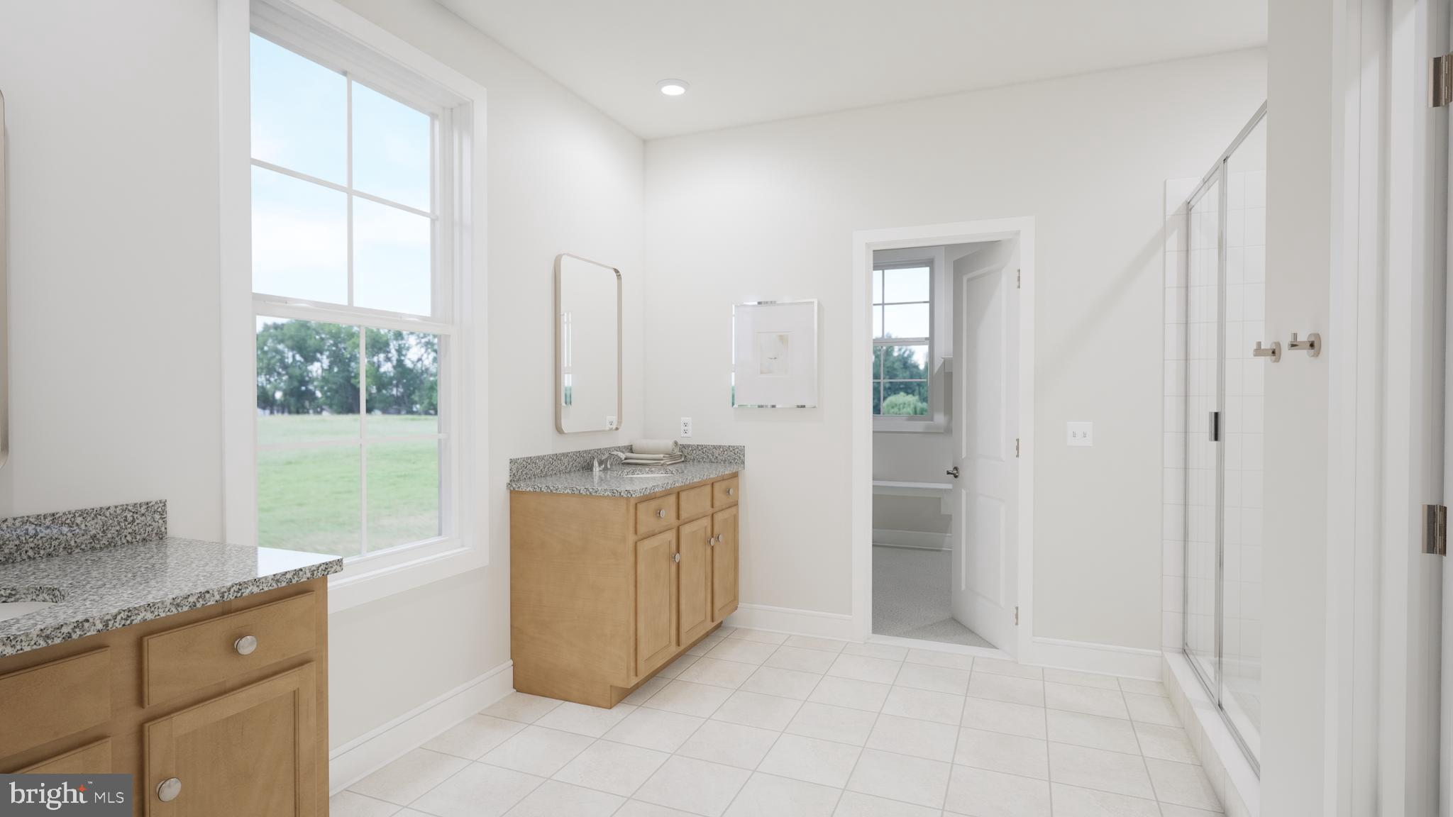 Snowden Bridge Boulevard Stephenson, VA 22656 - Photo 39 of 53 a view of kitchen with granite countertop cabinets and window