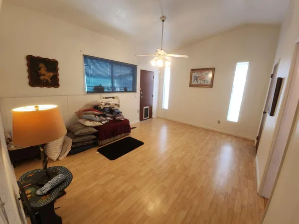 a room with furniture and a chandelier