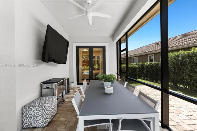 a view of a dining room with furniture window and outside view