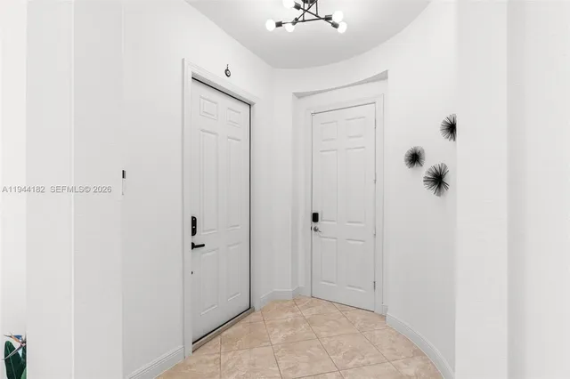 a view of a livingroom with furniture and stairs