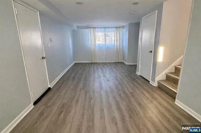 a bathroom with a shower and a toilet