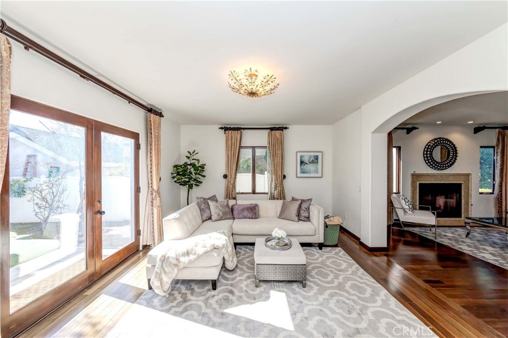 950 Old Mill Road Pasadena, CA 91108 - Photo 11 of 42 a living room with fireplace furniture and a large window