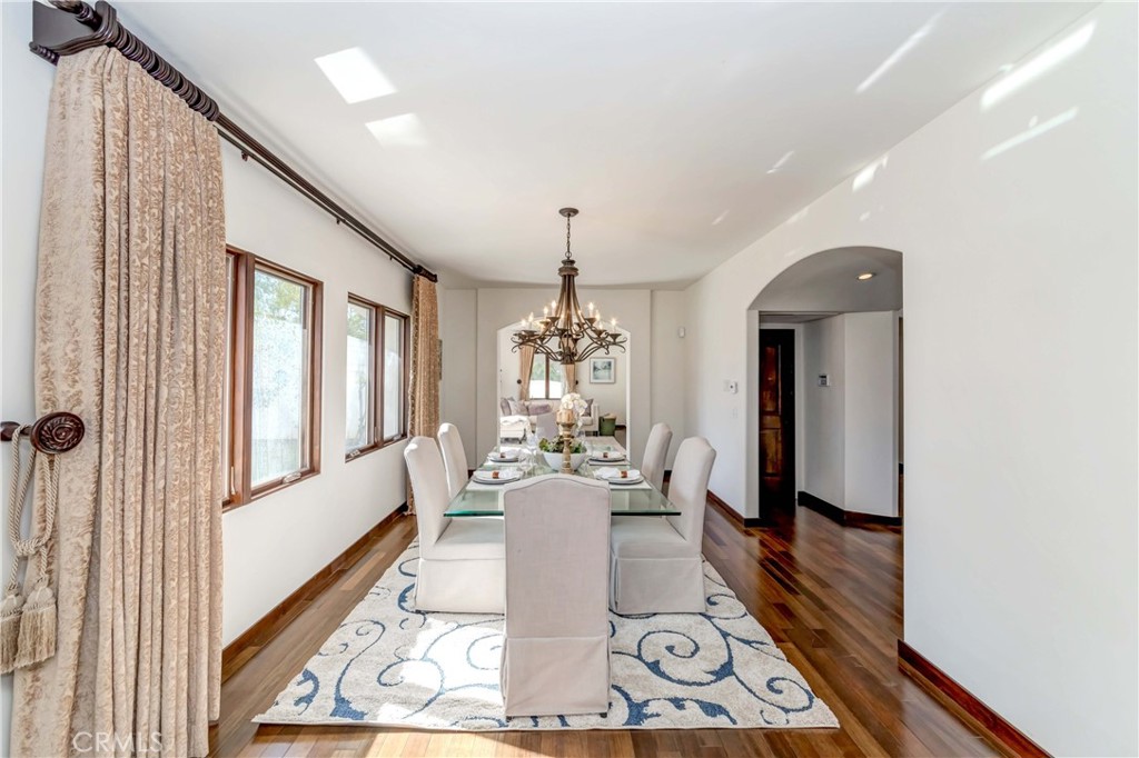 950 Old Mill Road Pasadena, CA 91108 - Photo 14 of 42 a living room with furniture and a large window
