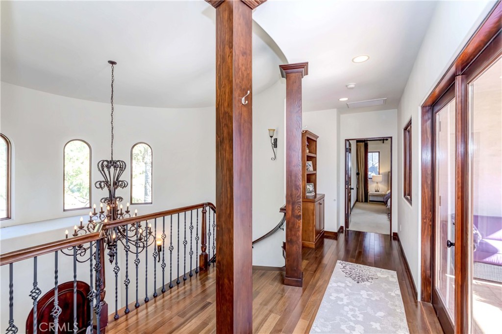 950 Old Mill Road Pasadena, CA 91108 - Photo 22 of 42 a view of a hallway with windows and stairs