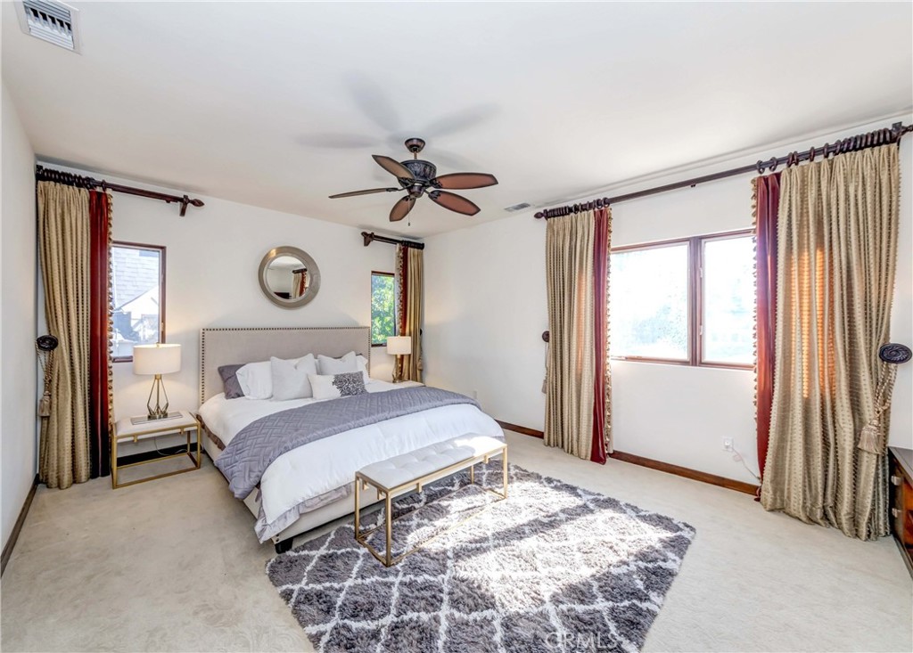 950 Old Mill Road Pasadena, CA 91108 - Photo 24 of 42 a bedroom with a large bed and a window