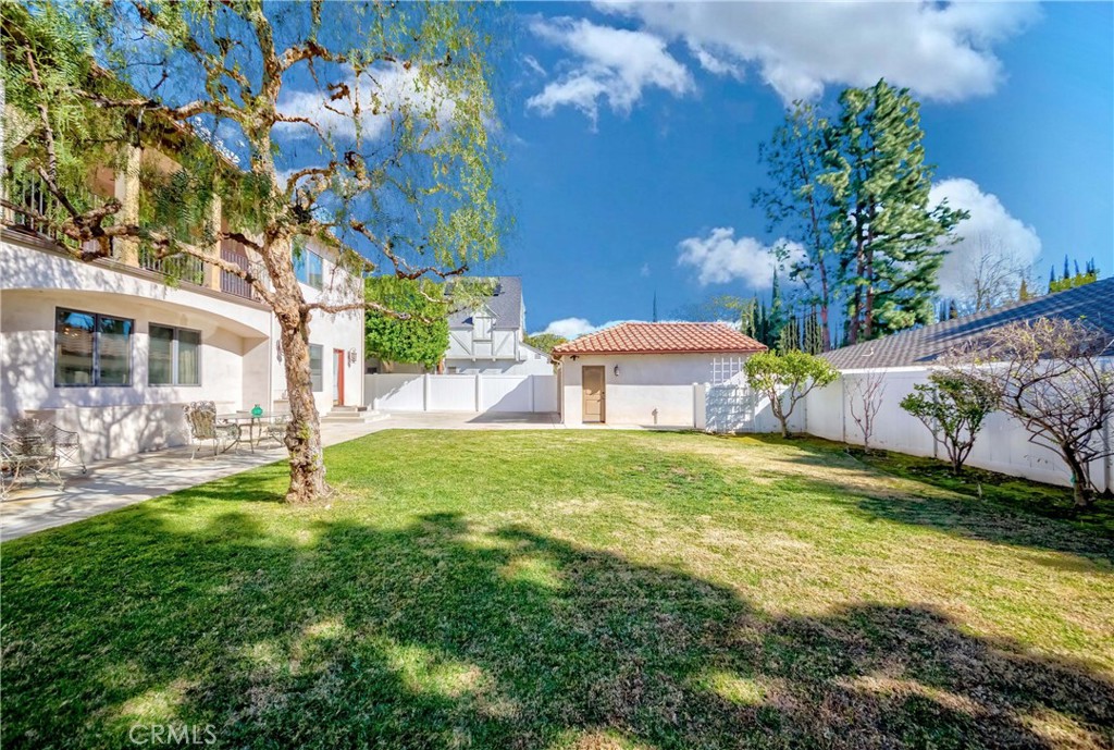 950 Old Mill Road Pasadena, CA 91108 - Photo 40 of 42 a view of a house with a big yard and large trees