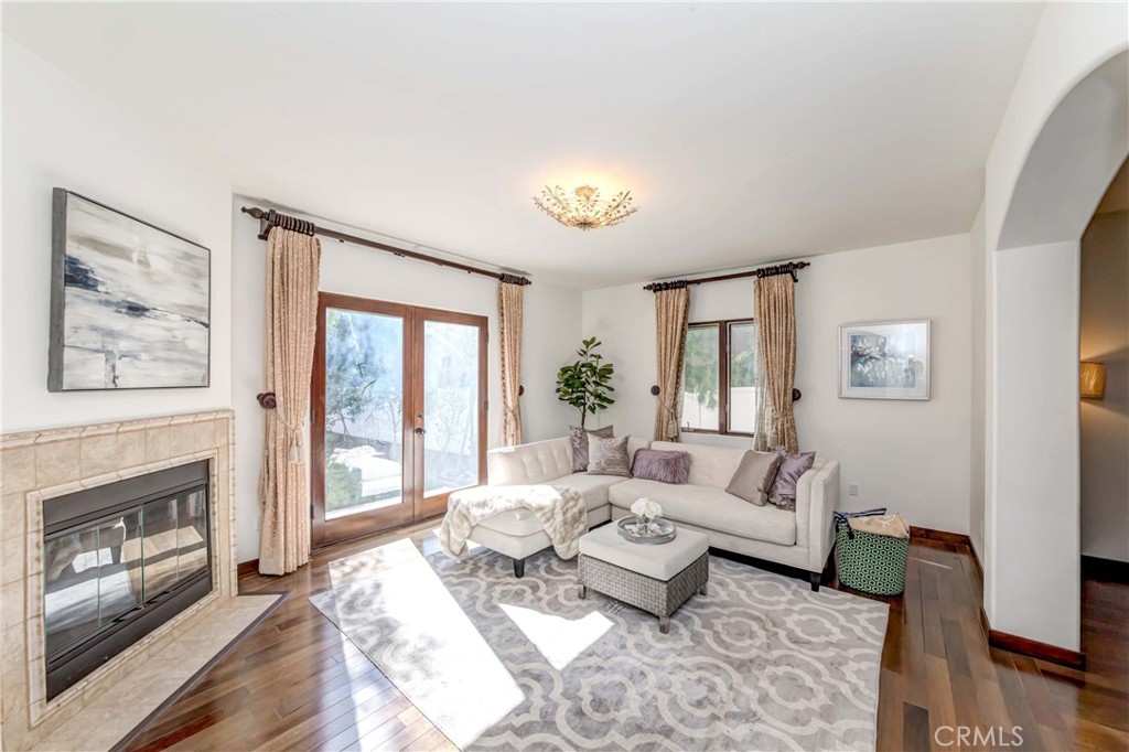950 Old Mill Road Pasadena, CA 91108 - Photo 10 of 42 a living room with furniture and a fireplace