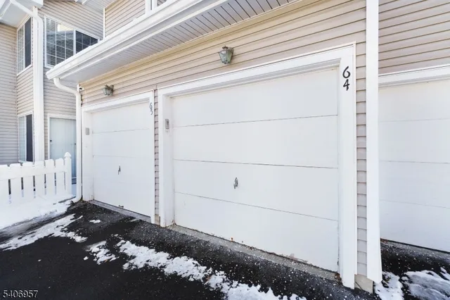 a view of a house with a small yard