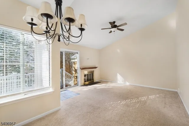 a view of empty room with windows