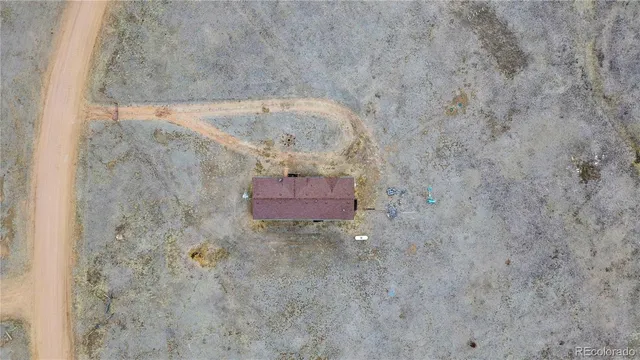 a view of a backyard of a house