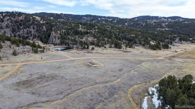a view of a backyard of a house