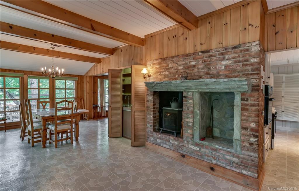 711 Green Hills Road Mill Spring, NC 28756 - Photo 14 of 23 a view of a dining room with furniture window and outside view