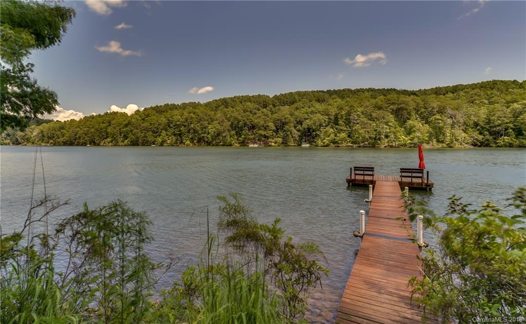 711 Green Hills Road Mill Spring, NC 28756 - Photo 5 of 23 a view of a lake with a outdoor space