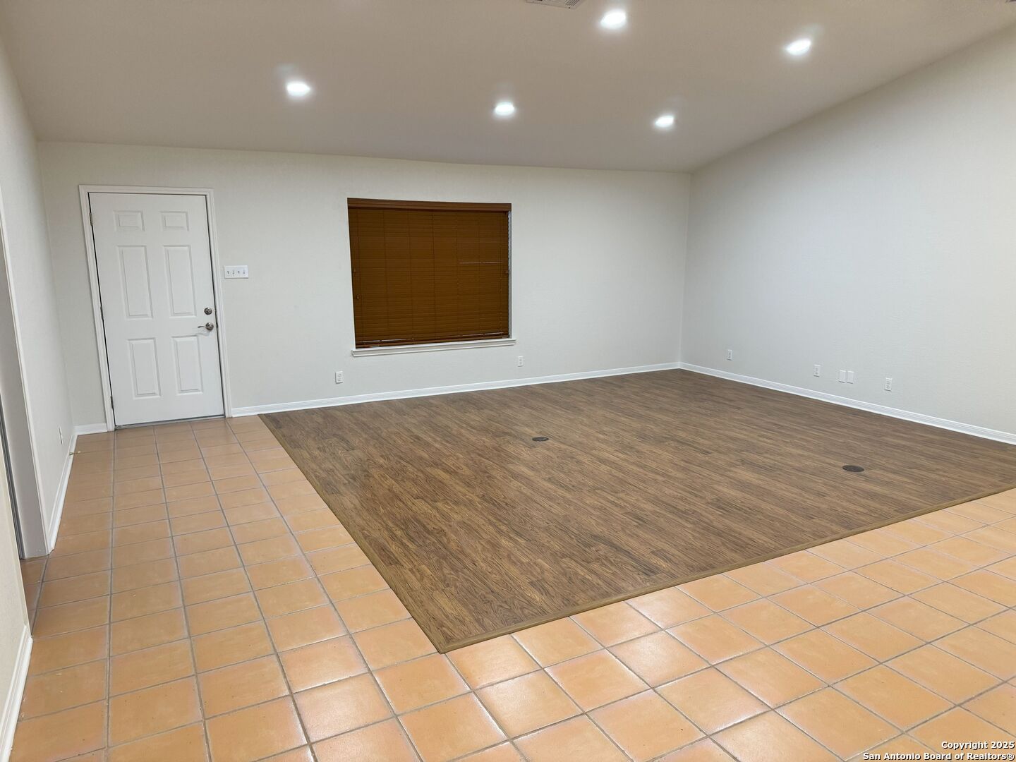 136 Lk Vw Terrace Three Rivers, TX 78071 - Photo 7 of 20 an empty room with wooden floor