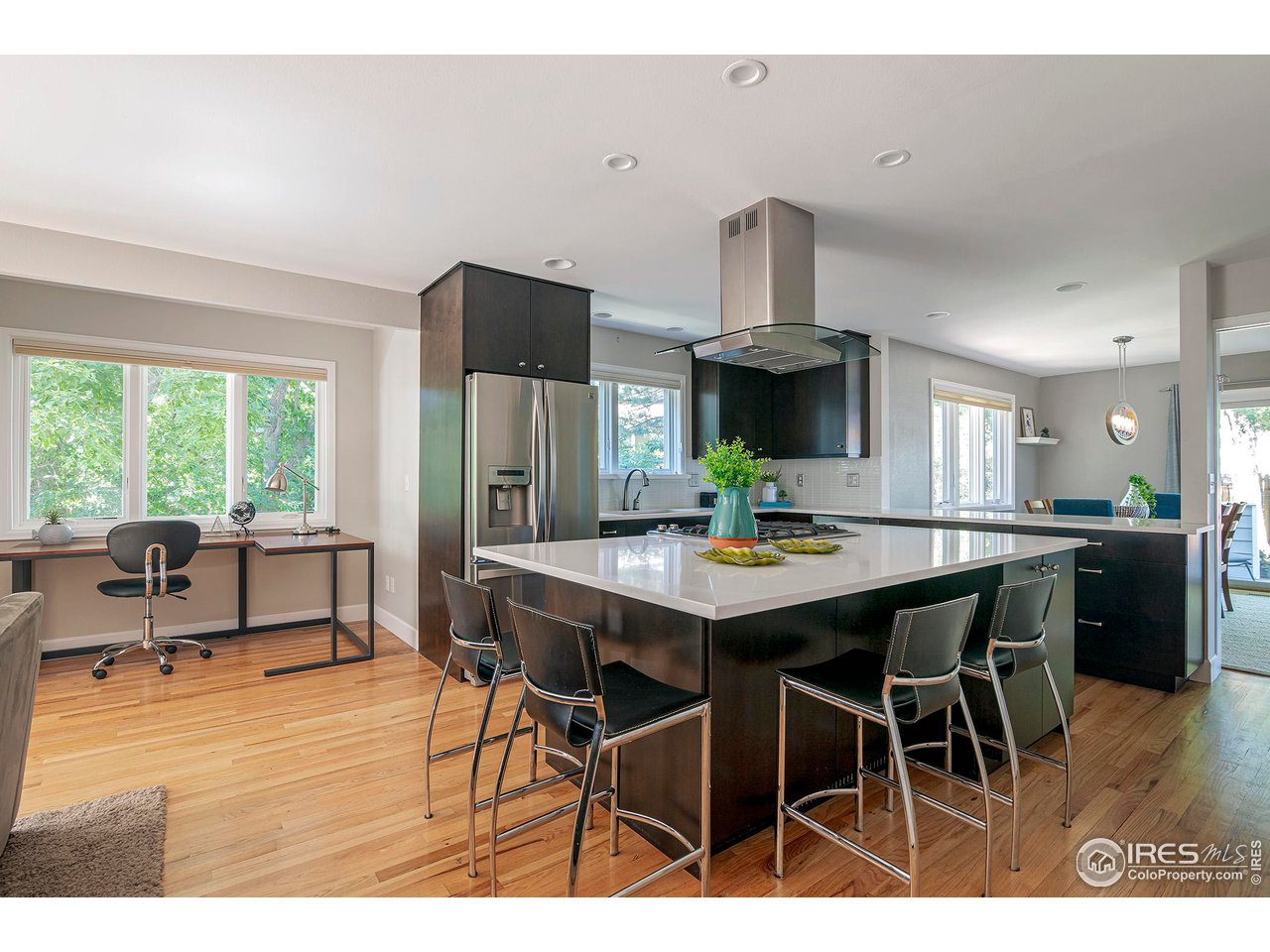476 Locust Place Boulder, CO 80304 - Photo 10 of 38 a view of a dining room with furniture and a large window
