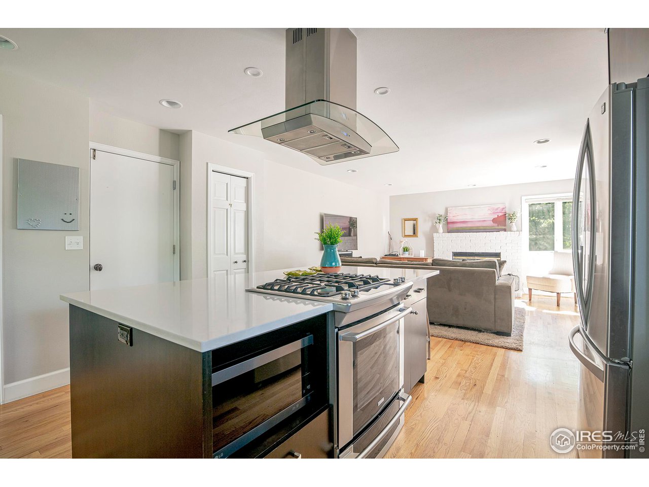 476 Locust Place Boulder, CO 80304 - Photo 12 of 38 a kitchen with stainless steel appliances a stove a refrigerator and a cabinets