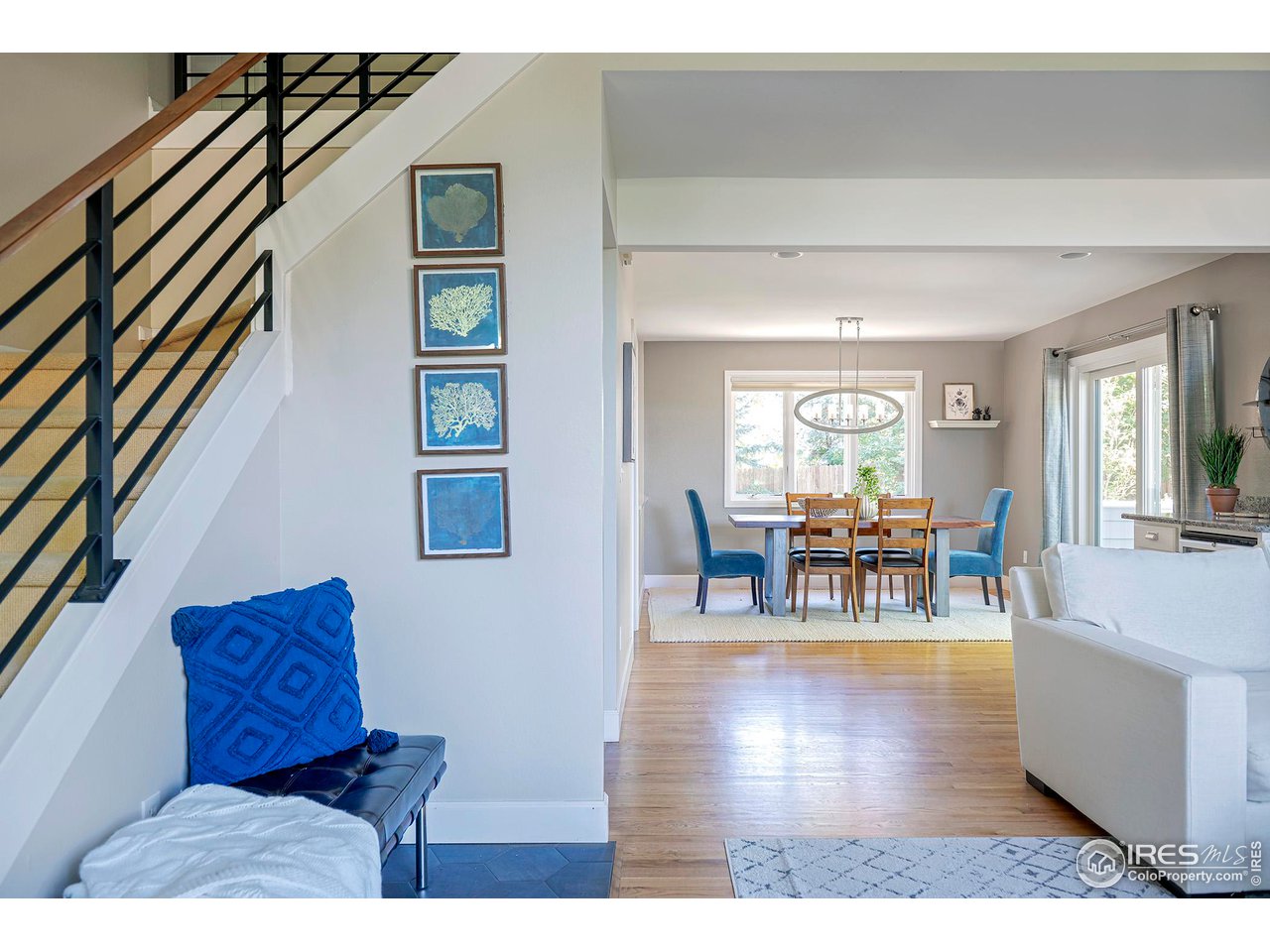 476 Locust Place Boulder, CO 80304 - Photo 2 of 38 a living room with furniture and wooden floor