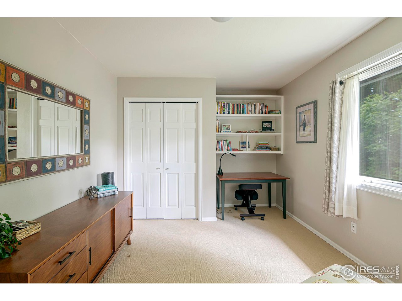 476 Locust Place Boulder, CO 80304 - Photo 25 of 38 a room with furniture and a window